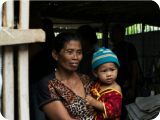 A mother and child receiving community support