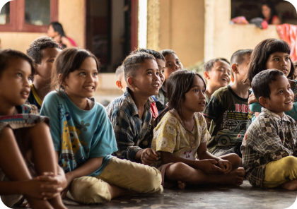 Children gathered together in their community